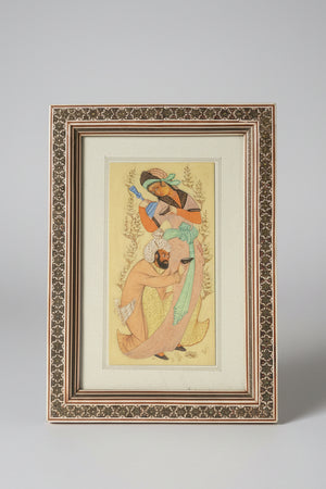 A Persian Hand Painted Panel With two Figures Housed in a Vizagapatam Style Easel Frame  31.5cm Tall