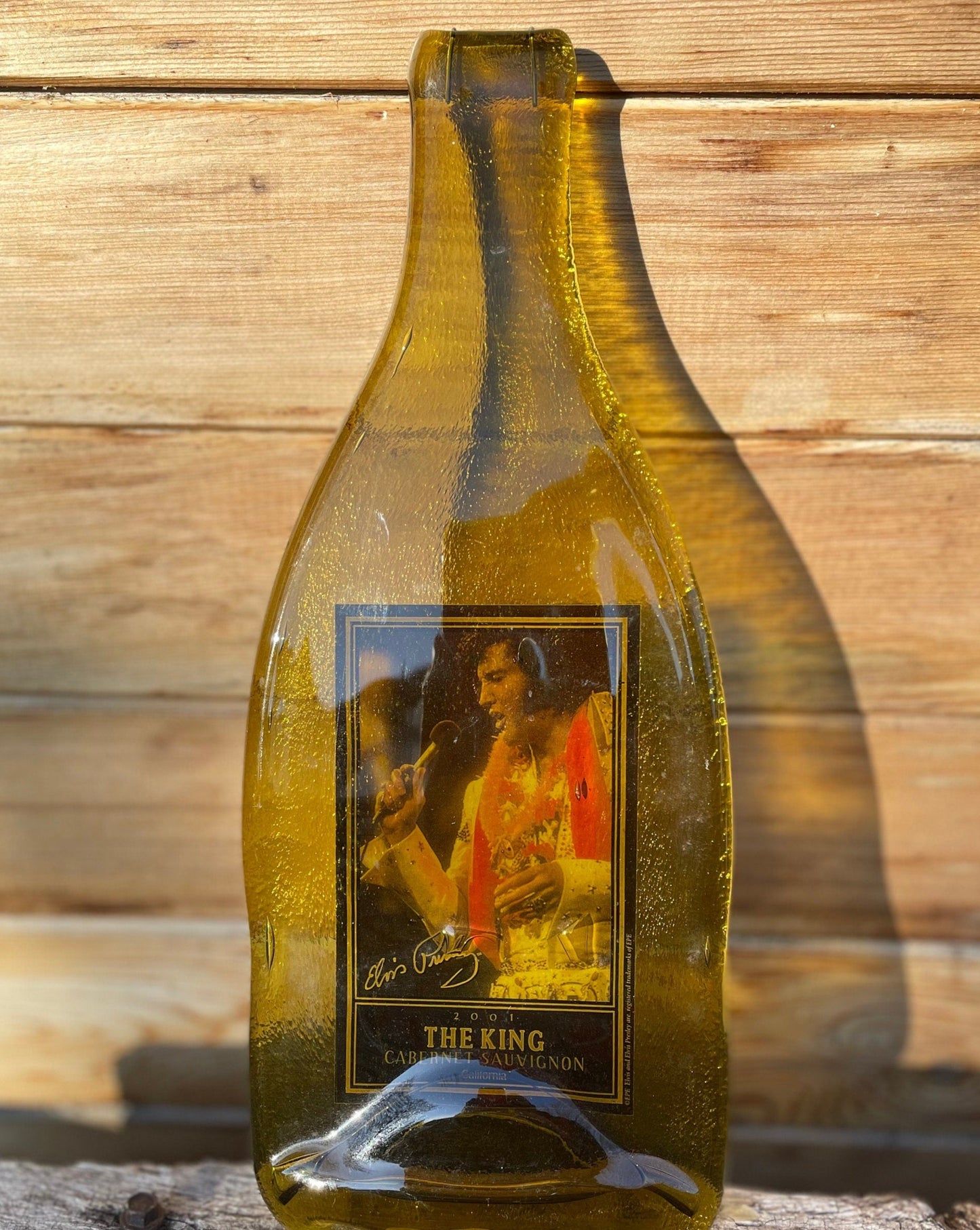 A Piece of Vintage Elvis Presley Memorabilia - Elvis captured in a 2001 The King Cabernet Sauvignon California wine bottle  - 31cm tall