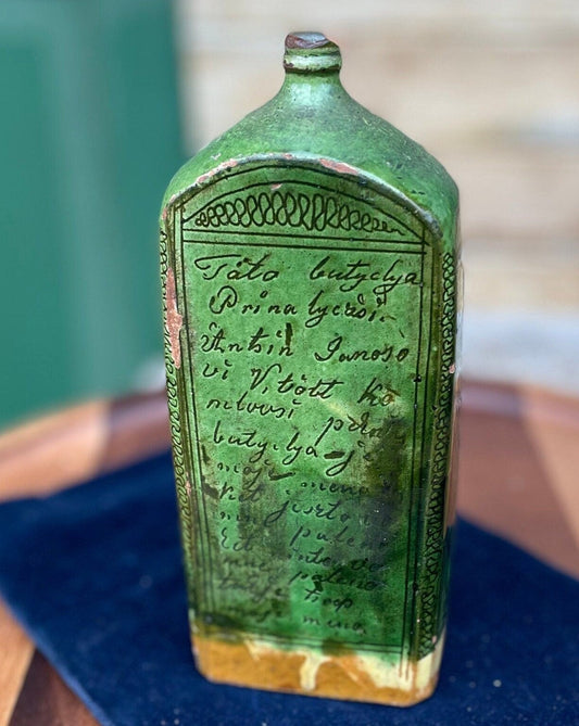 A 19th Century Green Glazed Terracotta Sgraffito Flask  19cm Tall