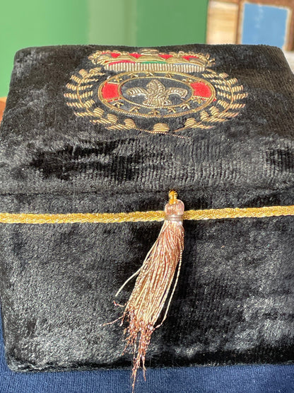 A black velvet jewellery casket with the French royalty emblem embroidered on the top 8cm tall