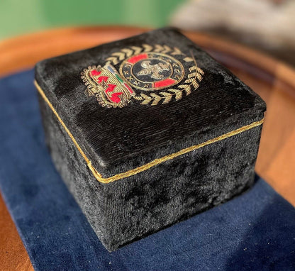 A black velvet jewellery casket with the French royalty emblem embroidered on the top 8cm tall