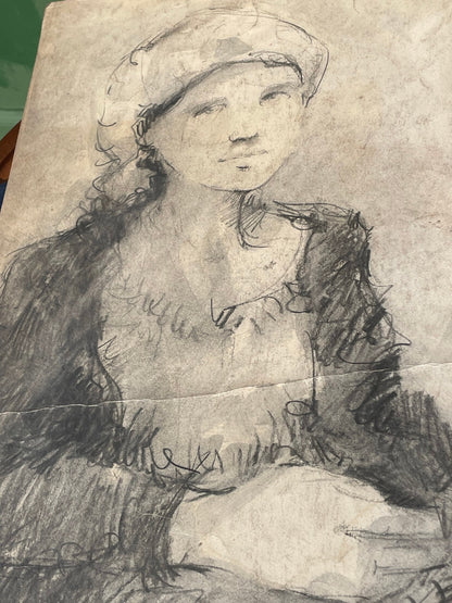 An original unsigned charcoal sketch on paper of a young lady 33x46cm