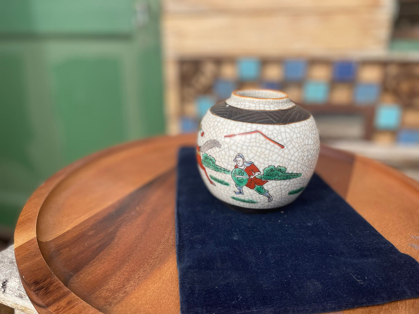 An early twentieth century Japanese crackle glazed mini ginger jar 10.5cm tall