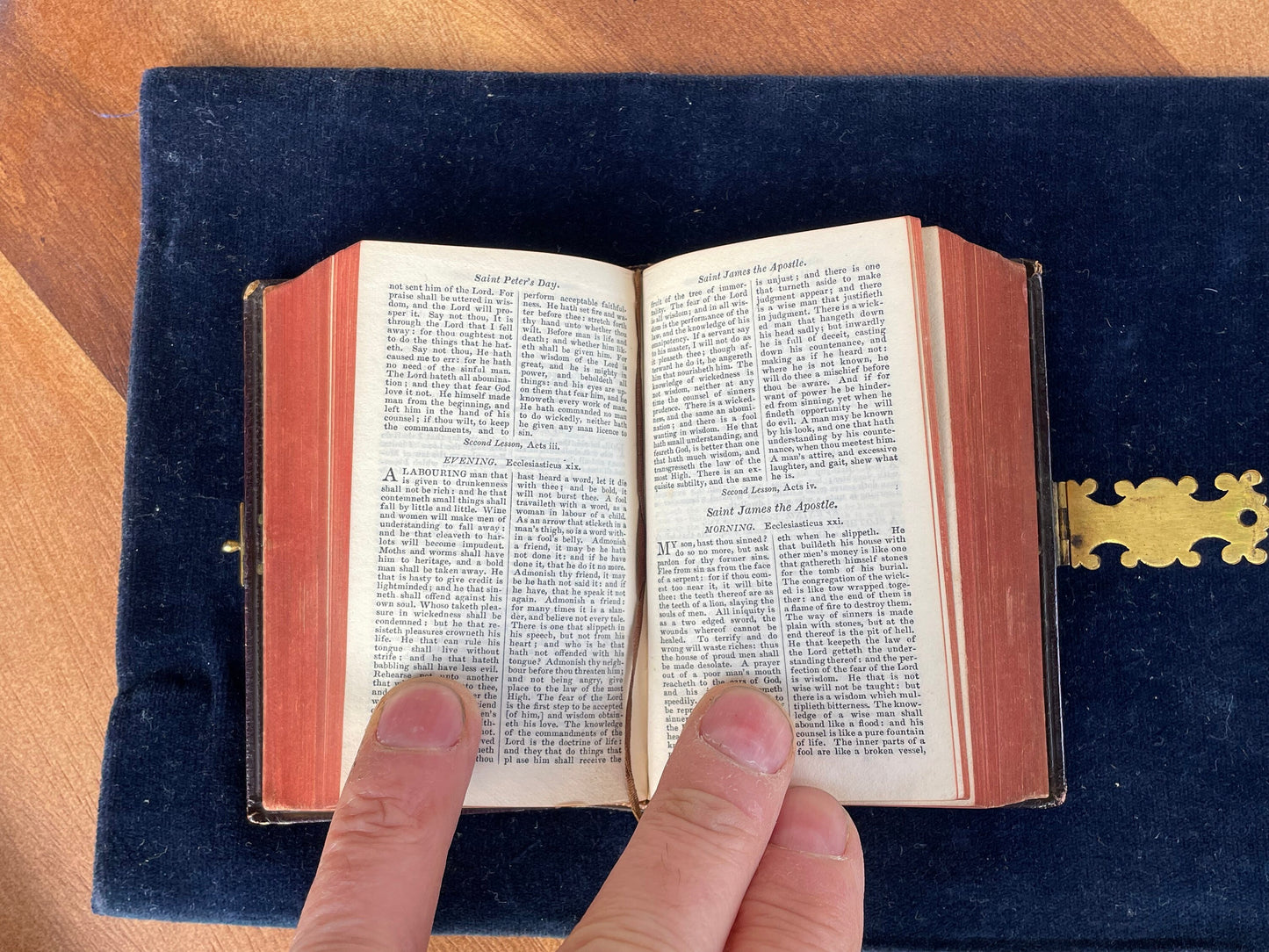 A burgundy leather bound antique Church Services common prayer book with gilt metal fastener 184