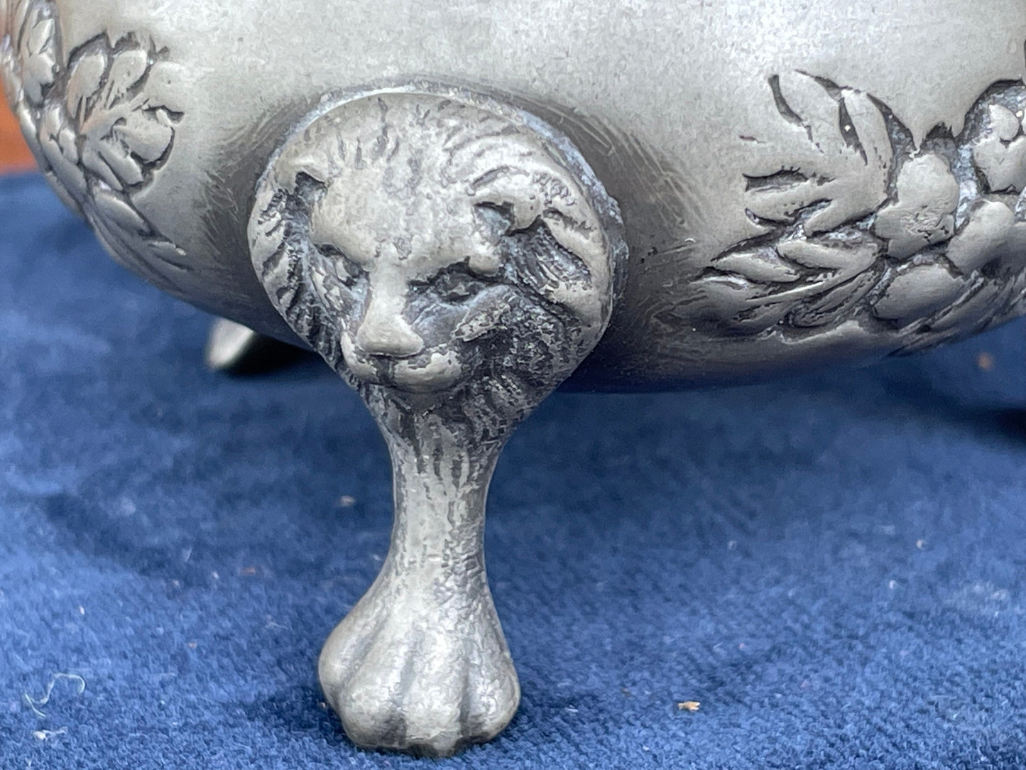 A pair of antique pewter salts with Bristol blue glass liners and lion feet 6.5cm diameter