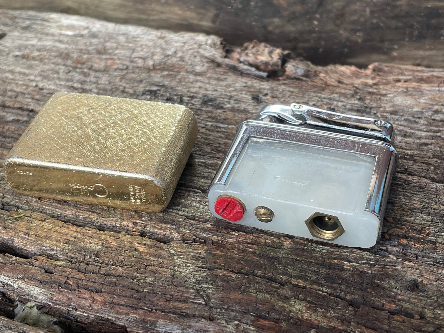 A vintage Colibri fuel lighter engraved with a star motif  4.5cm wide