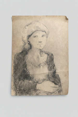 An original unsigned charcoal sketch on paper of a young lady 33x46cm