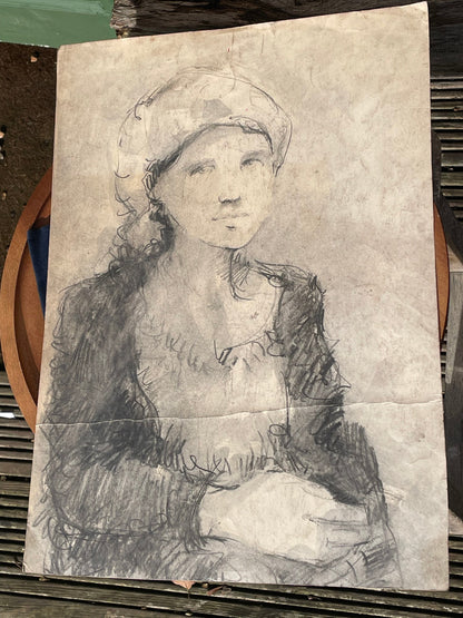 An original unsigned charcoal sketch on paper of a young lady 33x46cm