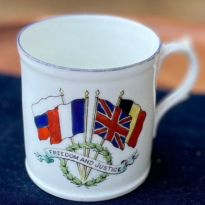 A WW1 allies Freedom and Justice commemorative mug 1918 - 7cm tall