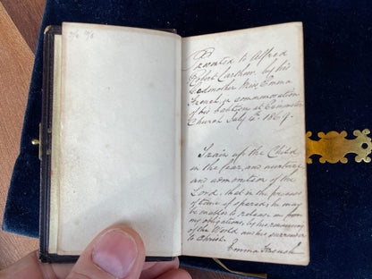 A burgundy leather bound antique Church Services common prayer book with gilt metal fastener 184