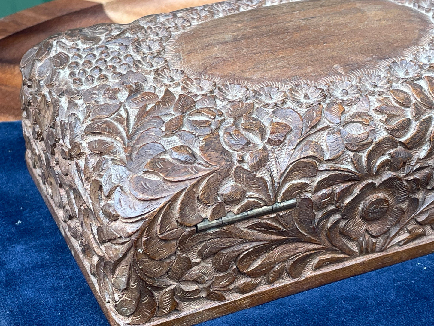 A vintage intricately hand carved wooden segmented Jewellery box 15.5cm wide