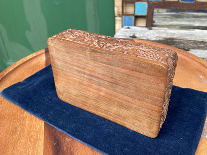 A vintage intricately hand carved wooden segmented Jewellery box 15.5cm wide