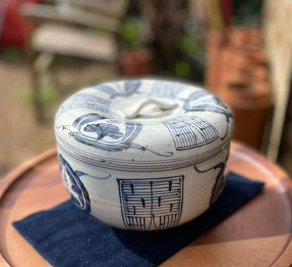 A large Japanese porcelain blue and white pot and cover 19cm diameter