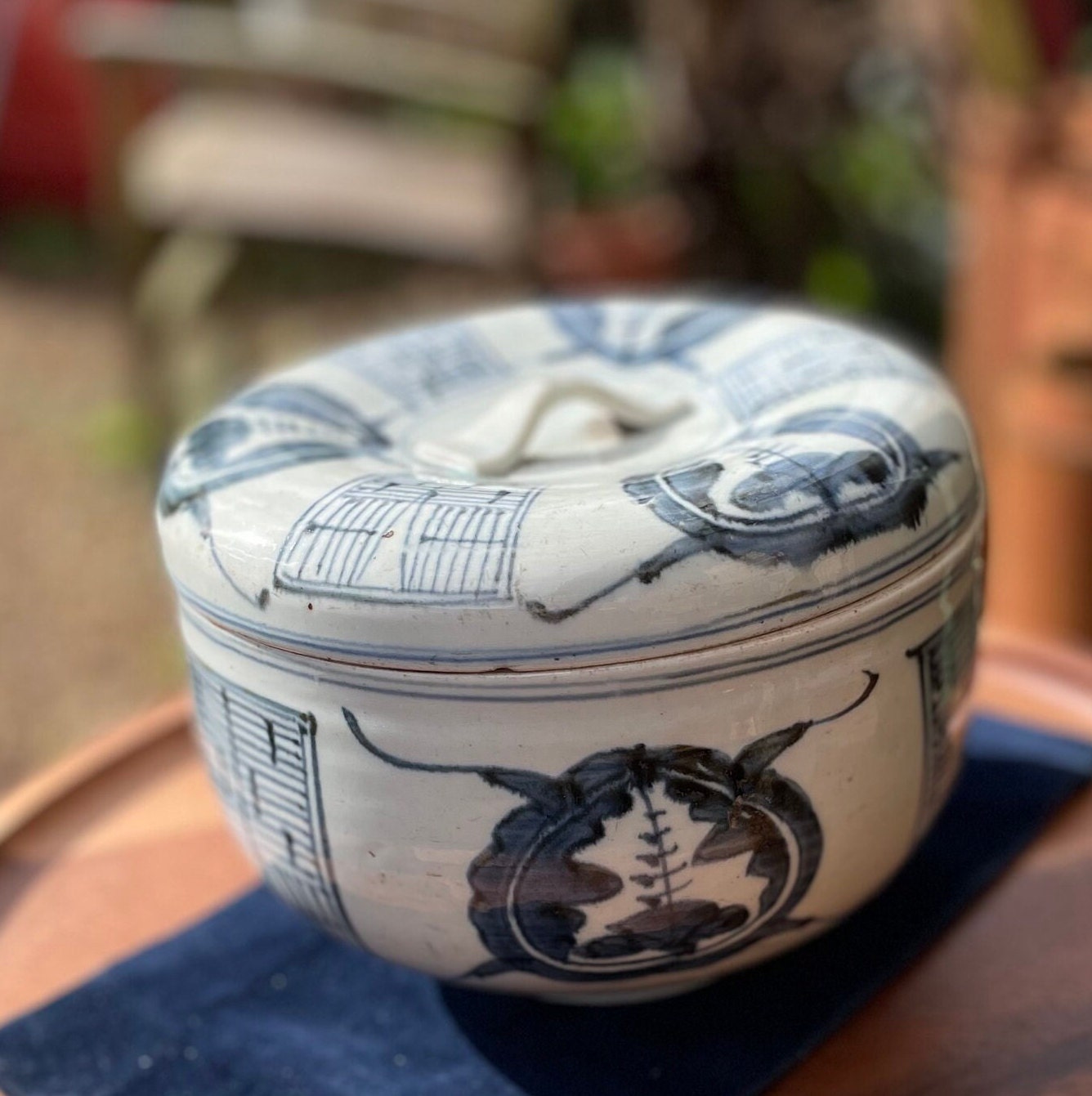 A large Japanese porcelain blue and white pot and cover 19cm diameter