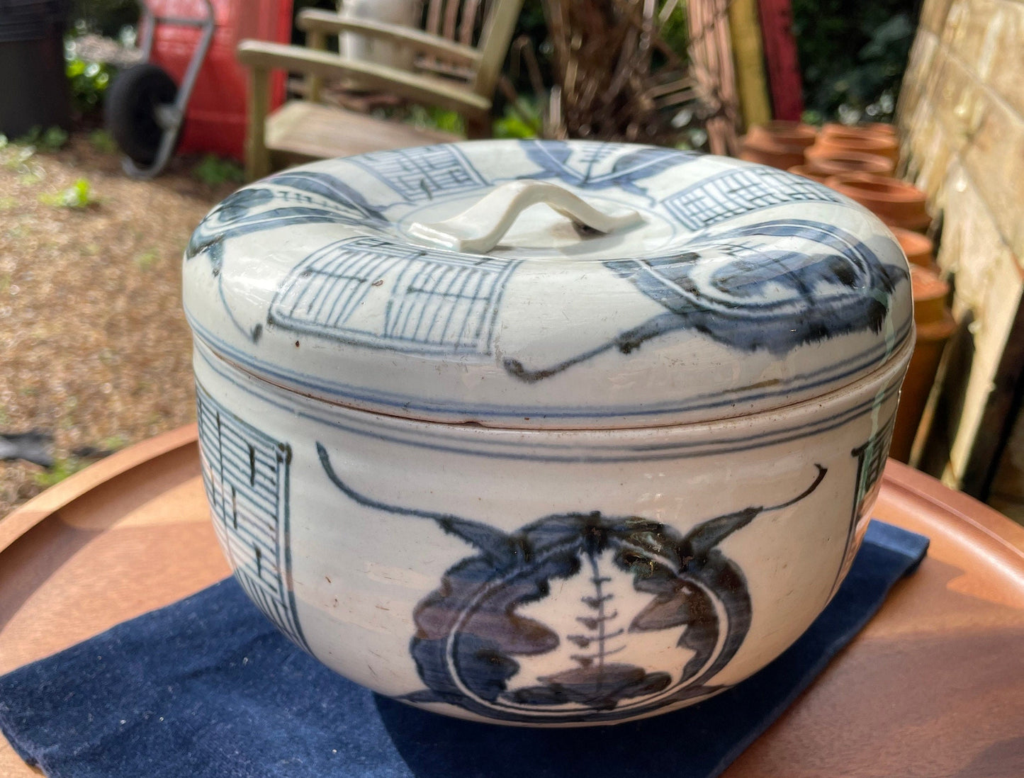 A large Japanese porcelain blue and white pot and cover 19cm diameter