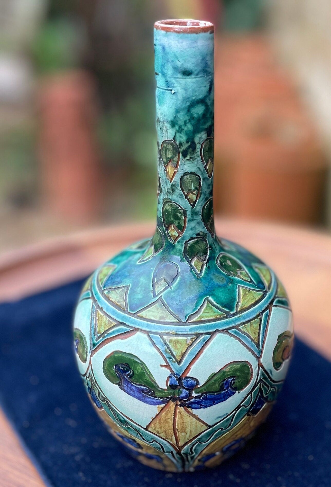 An antique pottery vase with Giovanni Carlo Valentino Manzoni mark to base  1897