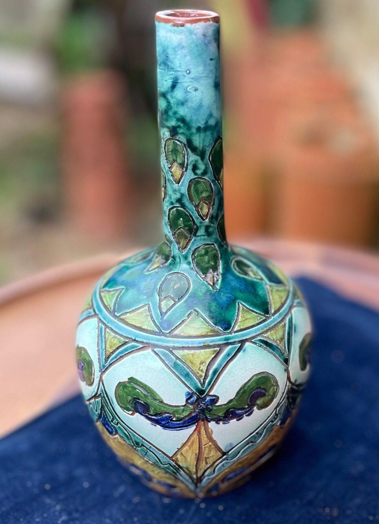 An antique pottery vase with Giovanni Carlo Valentino Manzoni mark to base  1897