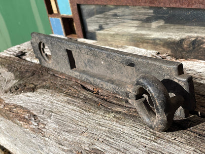 A heavy cast metal antique letter box and knocker combined fascia 31cm tall