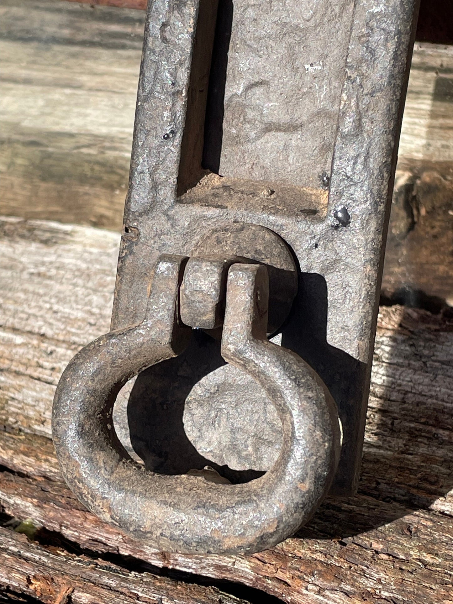 A heavy cast metal antique letter box and knocker combined fascia 31cm tall