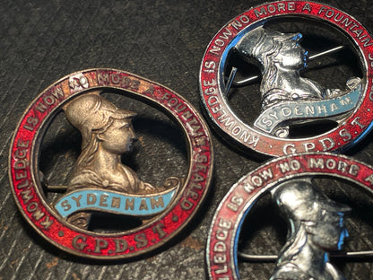 Three enamel badges from Sydenham High School in London with G.P.D.S.T- Sydenham ' on them 3.5cm diameter