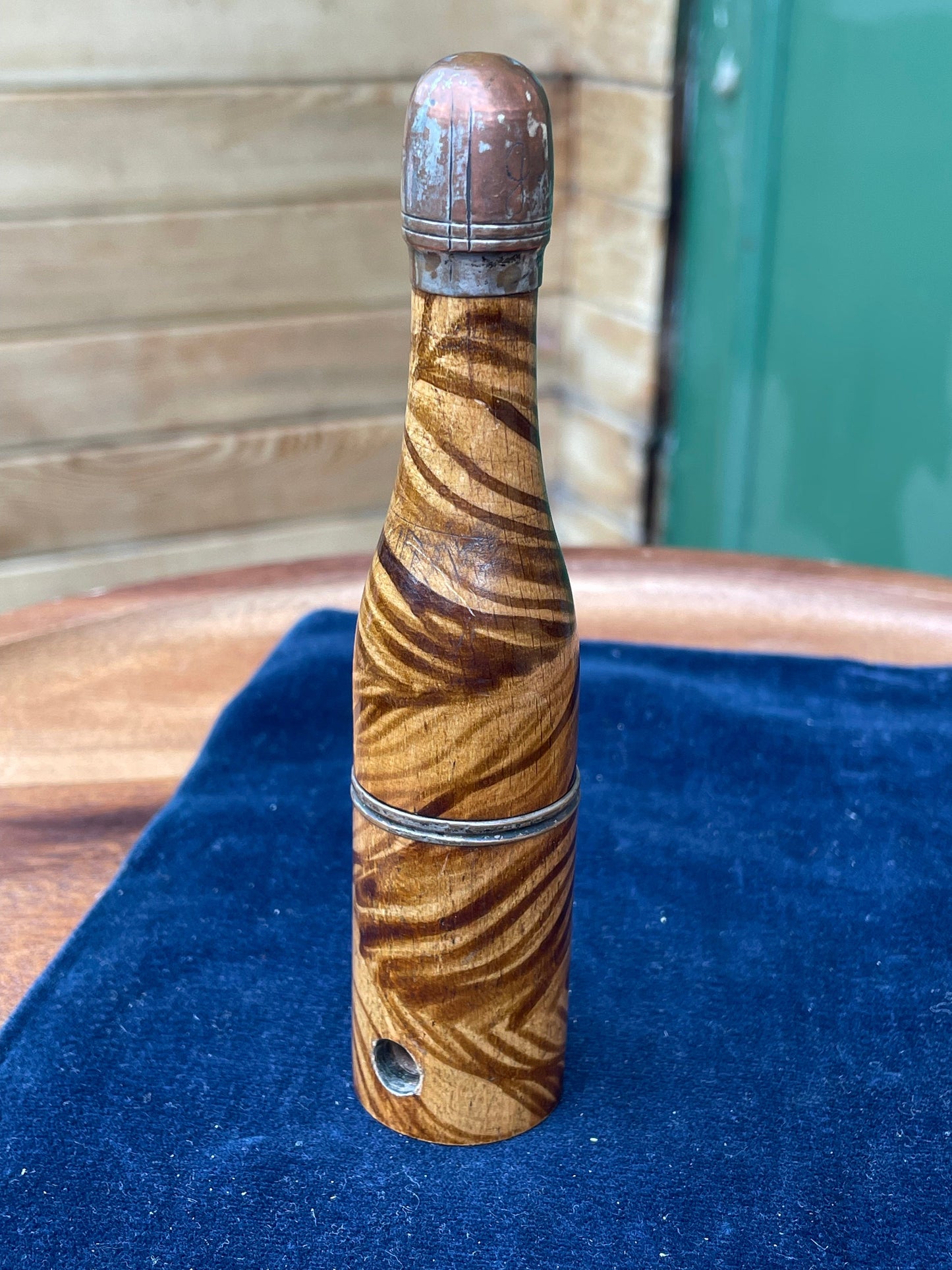 A vintage Wooden Smokers Pipe In the form of a champagne Bottle dated 1911 - 13.5cm tall