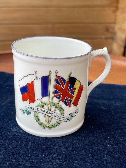 A WW1 allies Freedom and Justice commemorative mug 1918 - 7cm tall