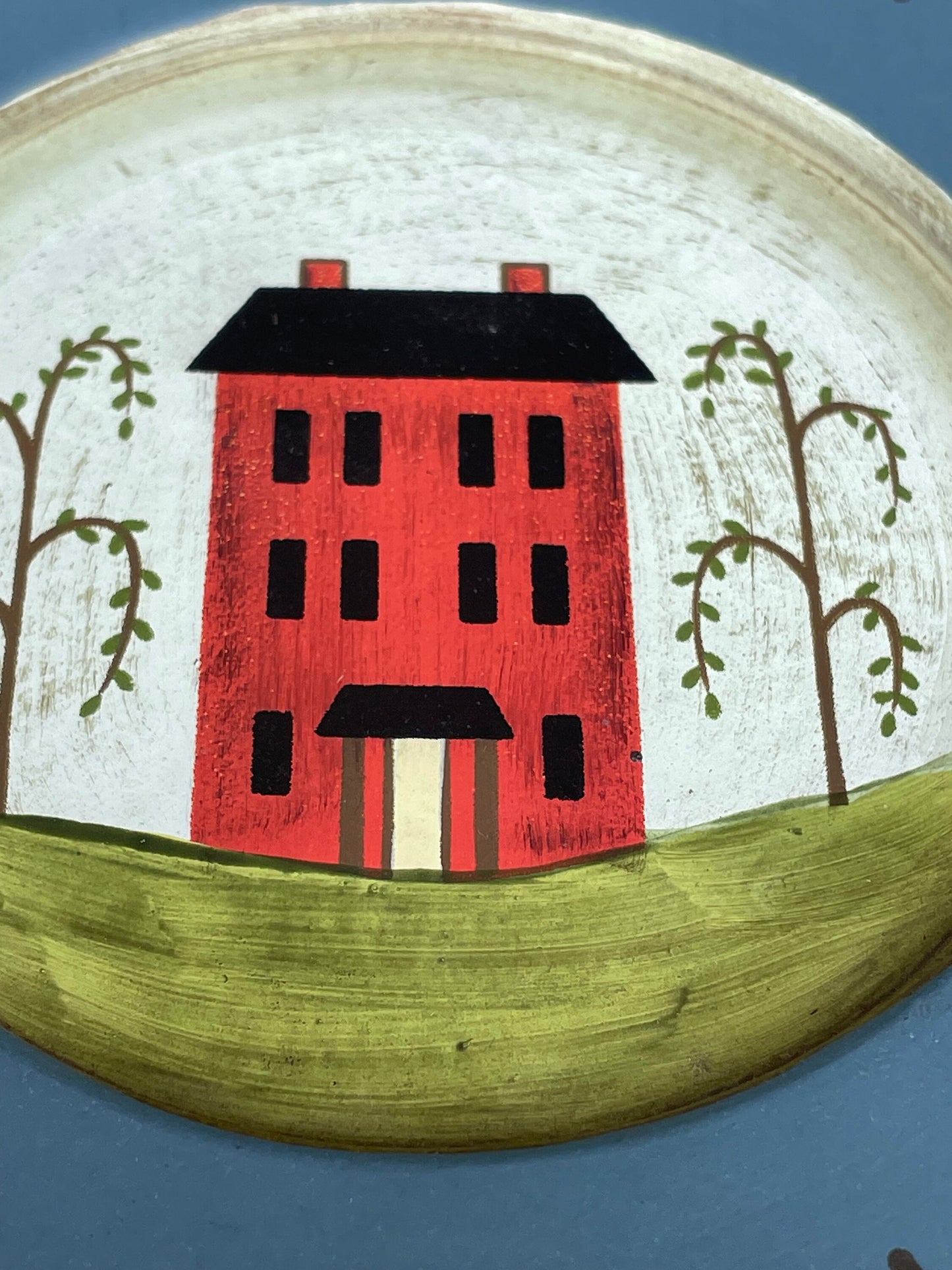 A primitive nave hand painted folk art wooden plate 17cm diameter