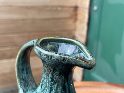 A Cornish  West Country English green honeycomb salt and pepper pot, vinegar pour and Jug set by Fosters Pottery