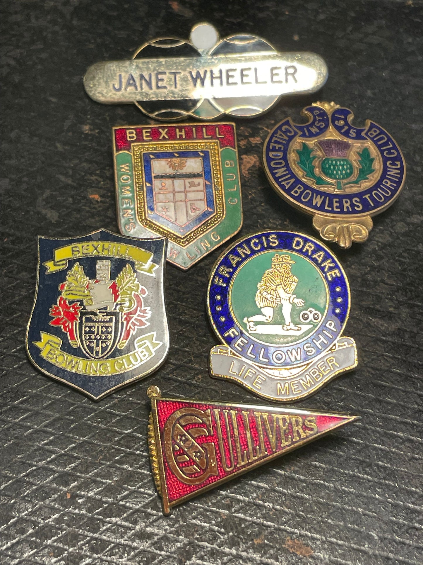 Six bowling related badges