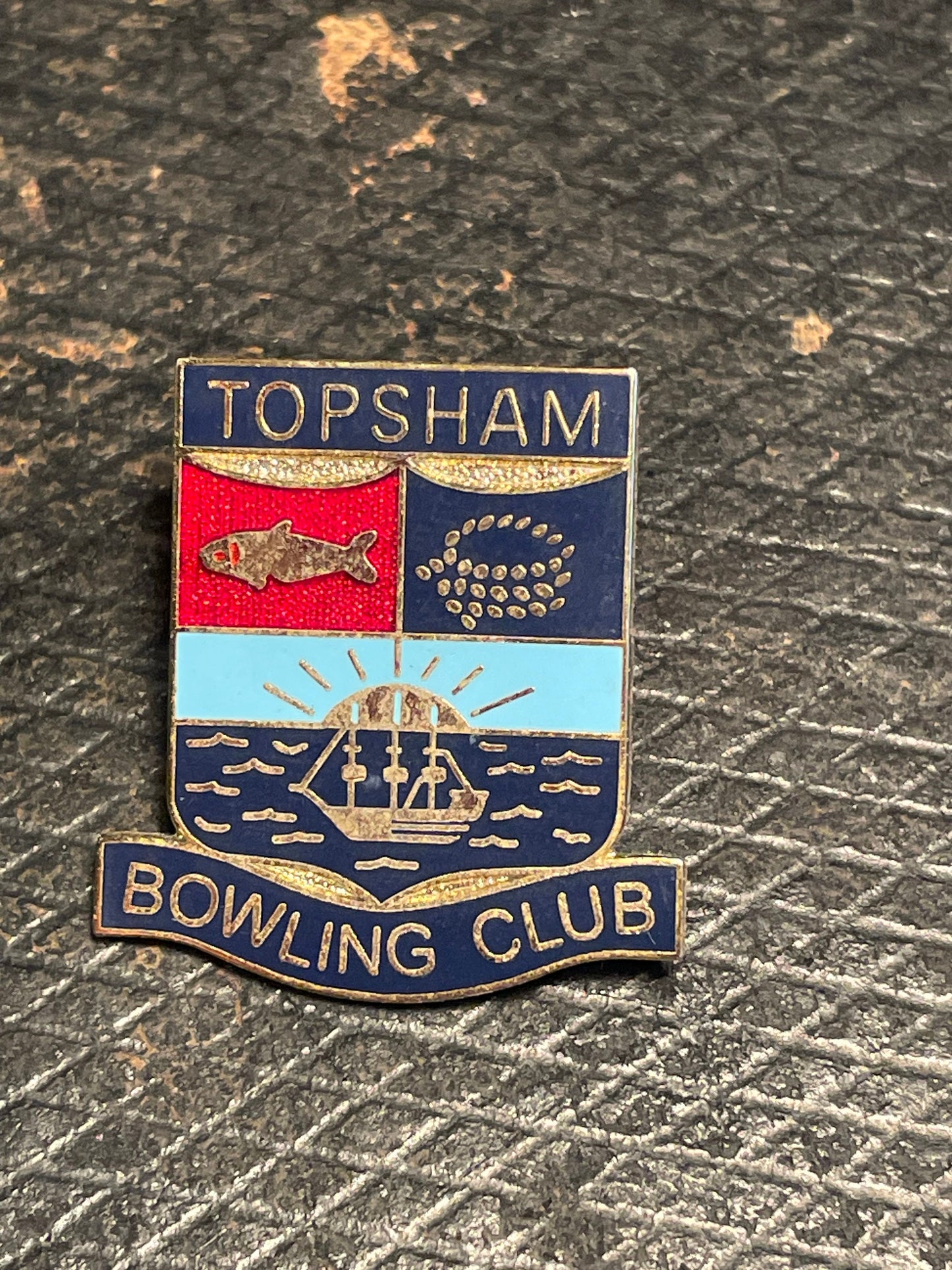 A vintage  brass and enamel Topsham Bowling Club pin badge