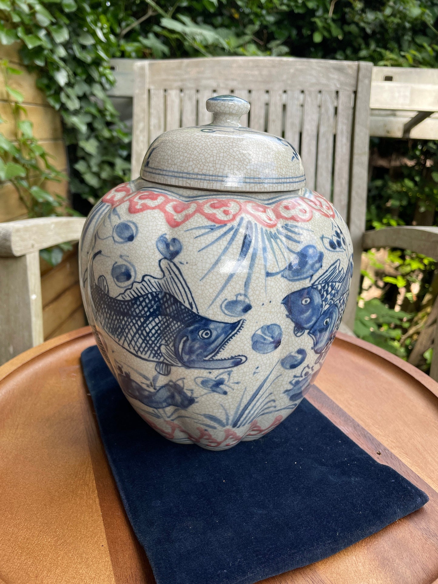 Chinese Yuan blue and white  crackle glazed jar and cover with fish design 23cm tall