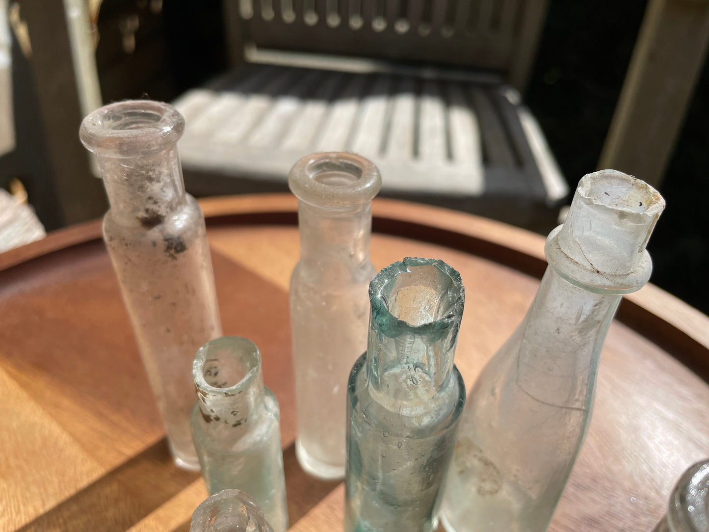 Seven Antique and vintage glass bottles tallest 15cm