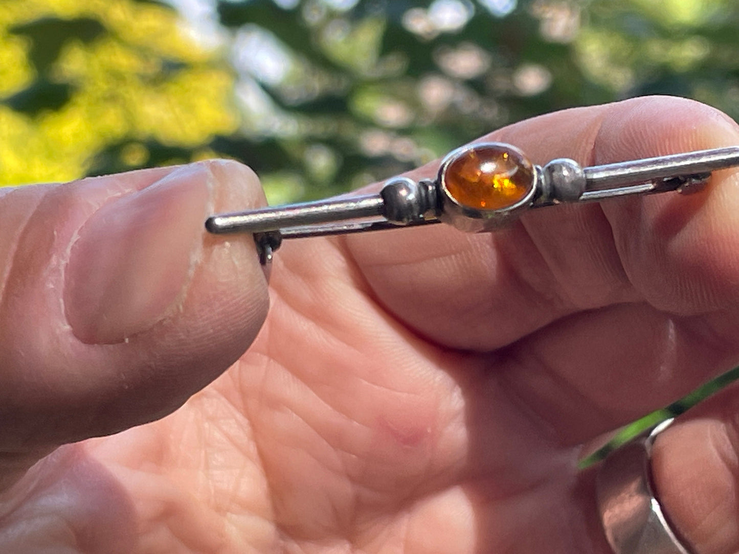 Unmarked silver and amber bar brooch 5cm long