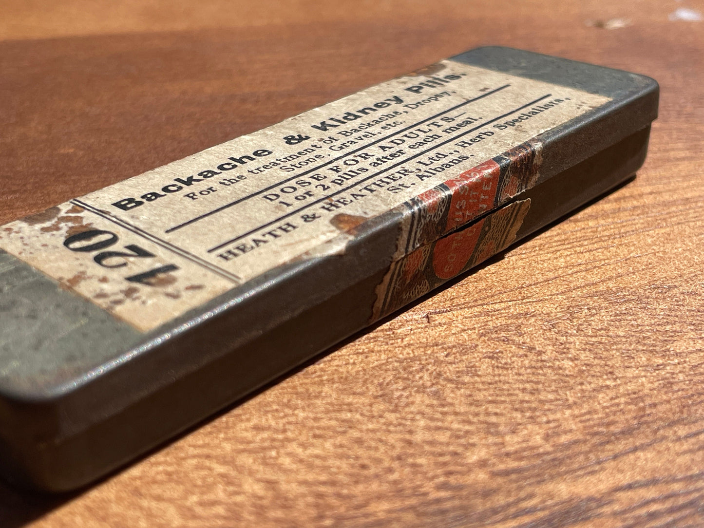 Antique advertising tin for backache and kidney pills Heath and Heather St Albans 9.5cm long