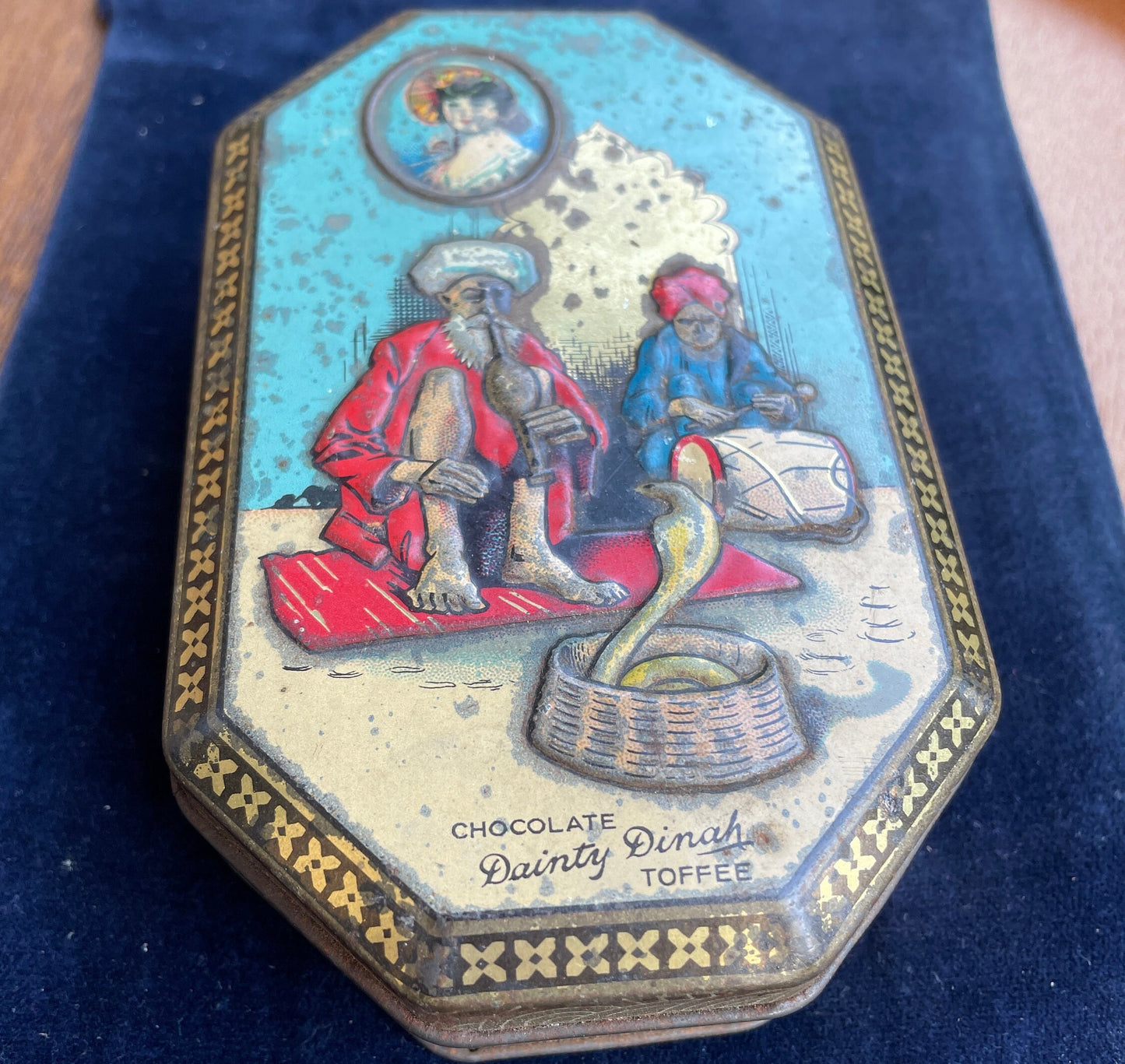 Vintage Dainty Dinah Chocolate Toffee Tin made by George Horner featuring Snake Charmer