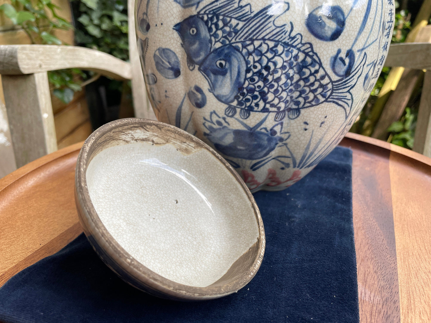 Chinese Yuan blue and white  crackle glazed jar and cover with fish design 23cm tall