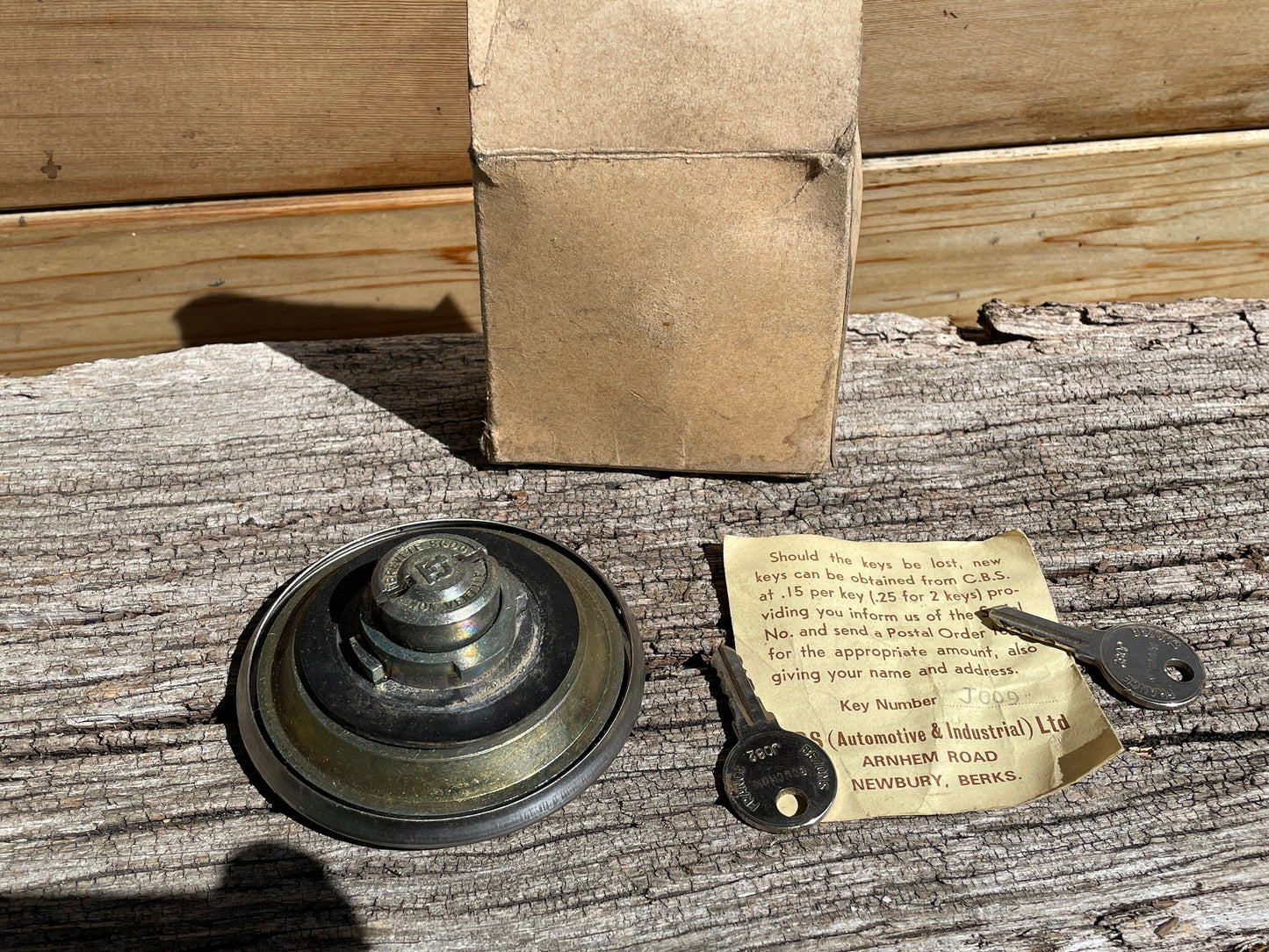 Original vintage car lockable stainless steel petrol cap in original box with 2 keys