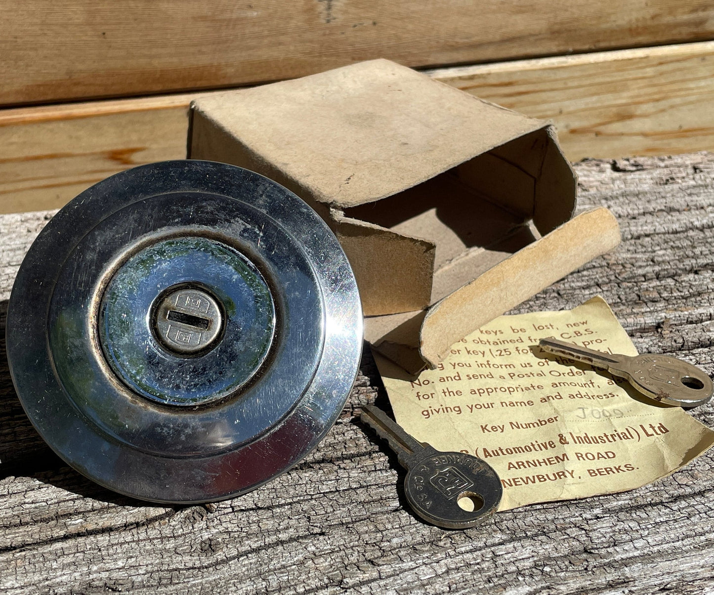 Original vintage car lockable stainless steel petrol cap in original box with 2 keys