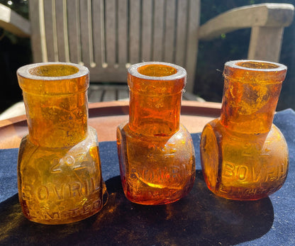 Three vintage Bovril 2oz brown glass bottles 8cm tall