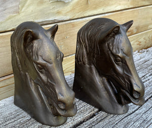 Two Bronze horse head sculptures 14cm tall