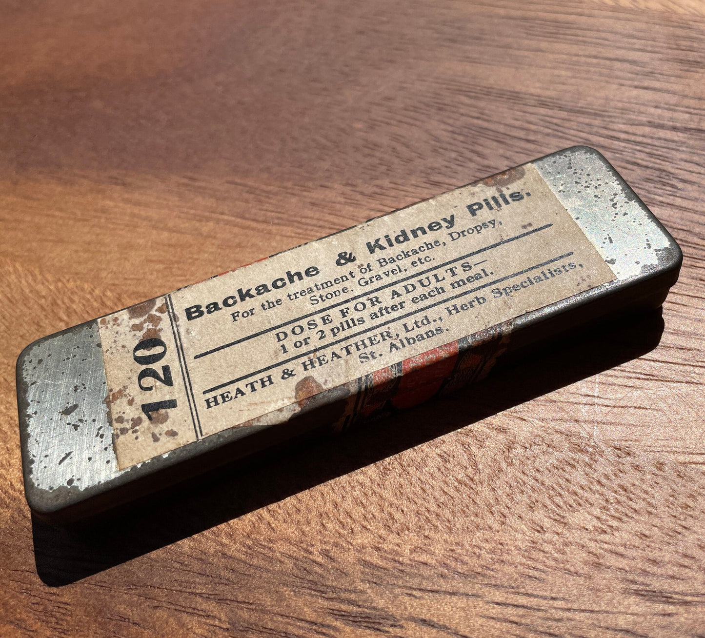 Antique advertising tin for backache and kidney pills Heath and Heather St Albans 9.5cm long