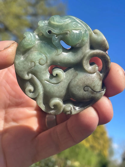 A Chinese Russet Jade Bi Disc 5.5cm Across