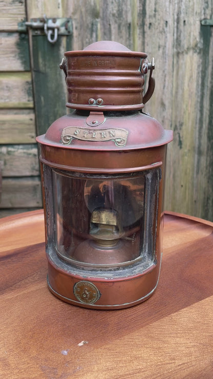 Antique brass and copper stern nautical lamp by seahorse of Great Britain