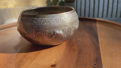 Indian white metal bowl heavily embossed with wild creatures 13cm diameter 141g