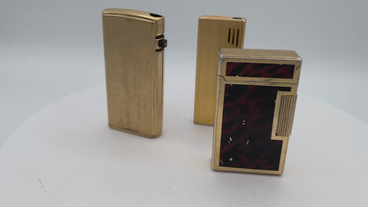 Vintage Trio of Collectible Pocket Lighters: Ronson Varaflame, Win 3000, and M-2500 Piezo Electric – Mid-to-Late 20th Century